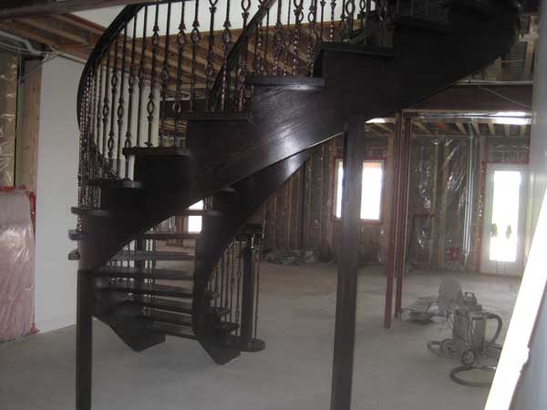 Custom geometric pattern hardwood installations in a luxury home near Guelph